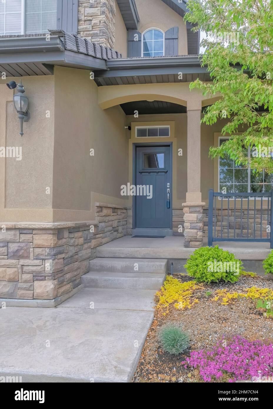 Vertical Colorful front yard garden of a house with contemporary ...