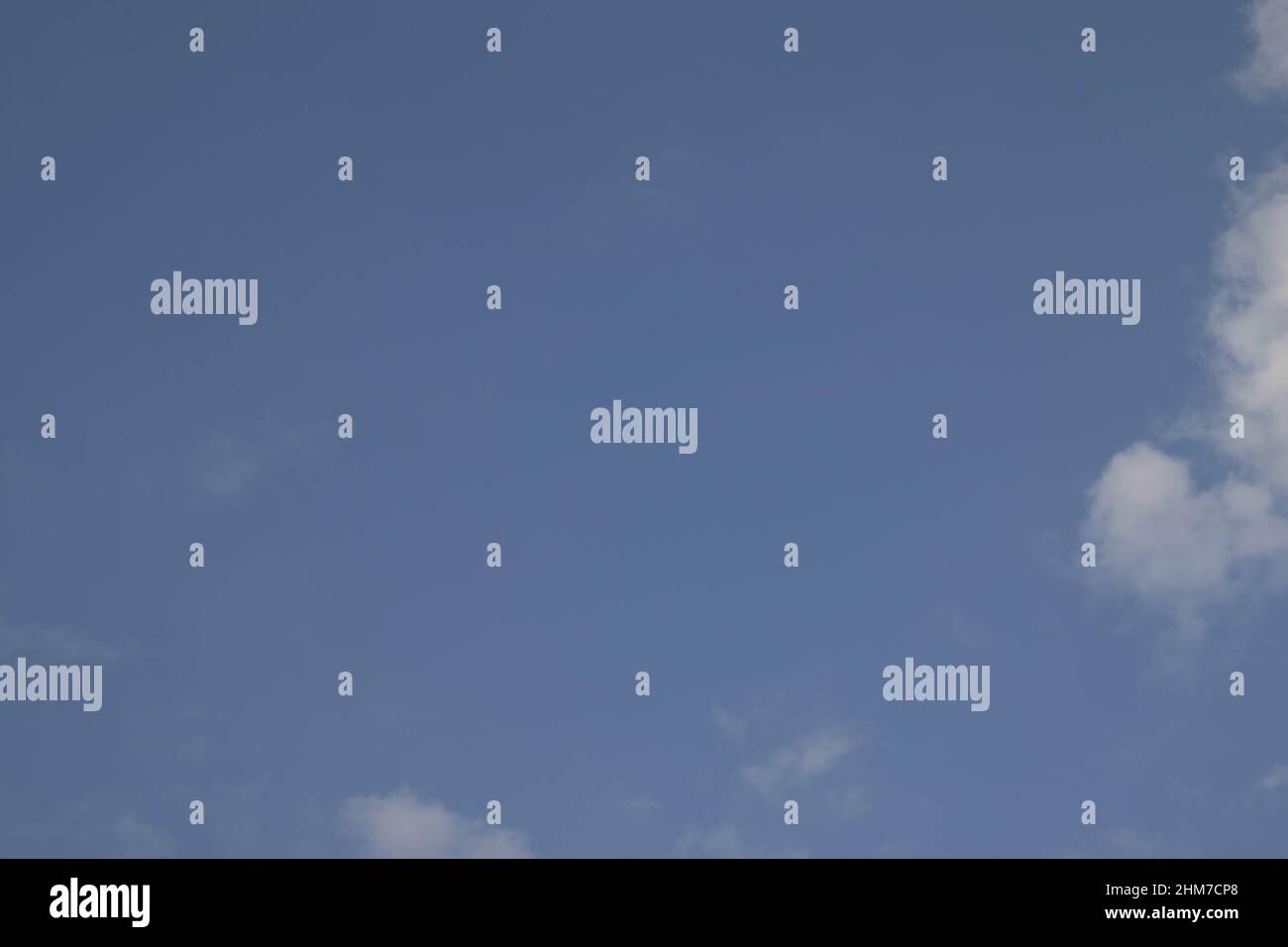 Morning sky with white clouds, full frame picture Stock Photo - Alamy