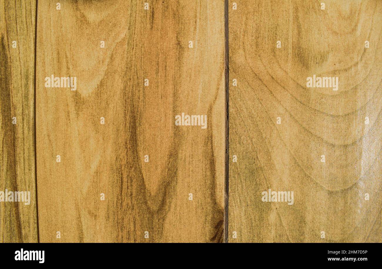 Wooden light beige brownish tone Textured wood background photo images. Vinyl flooring or Furniture table top woody backfrop Stock Photo