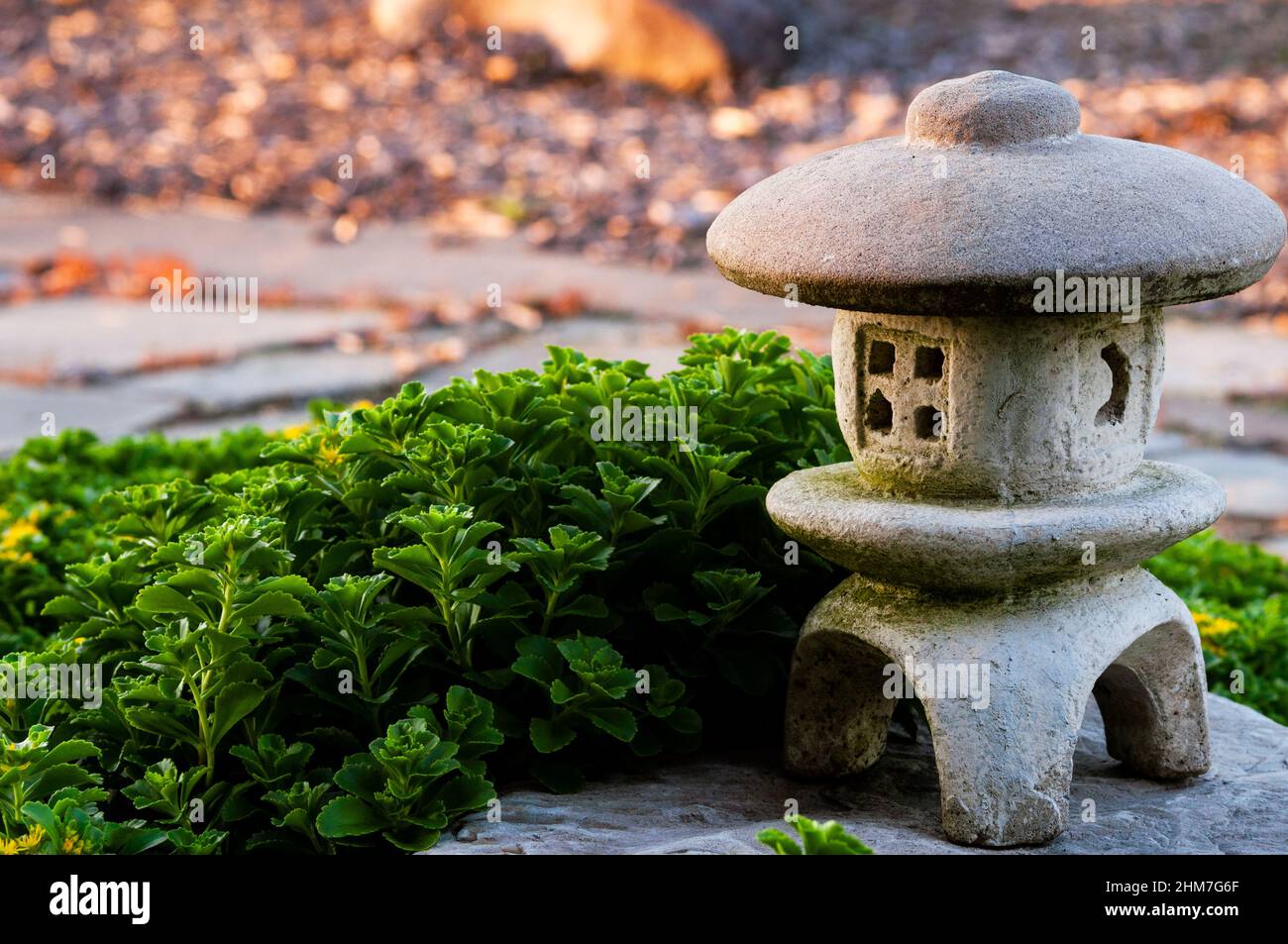 Japanese stone ornamental lantern. Stock Photo