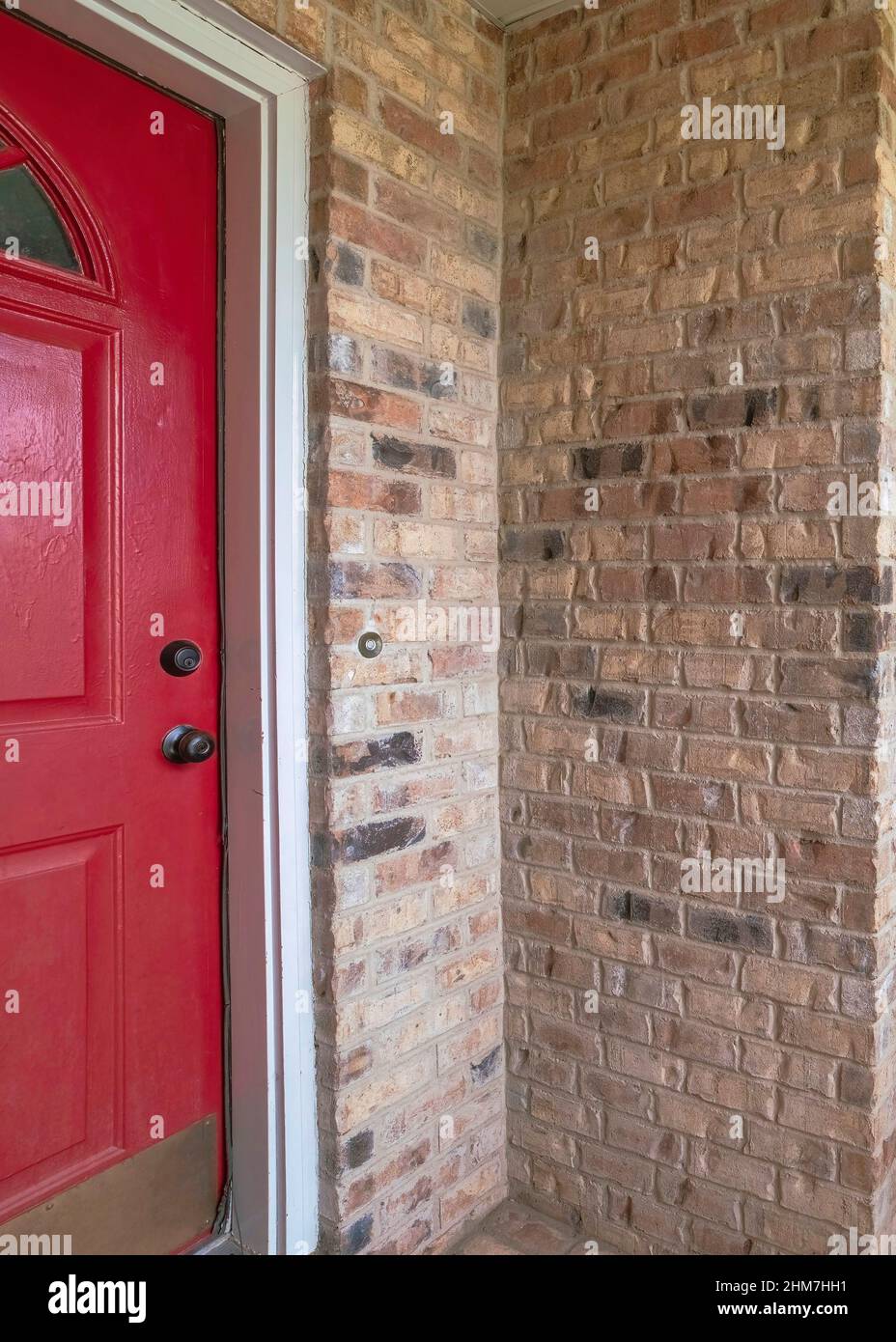 Vertical Porch of a house with bricks and plants at the front Stock ...