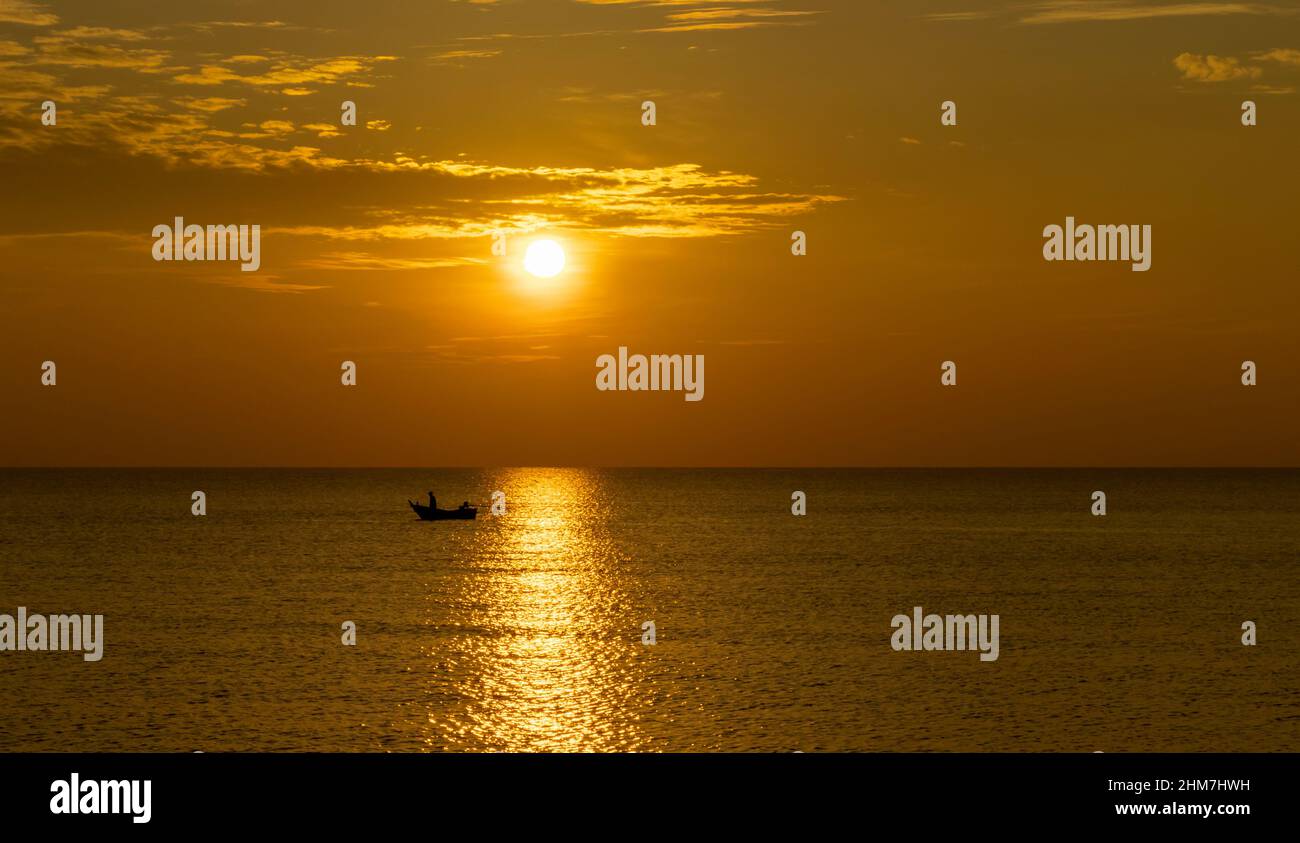 boat in the sea in the morning, sunrise Stock Photo - Alamy