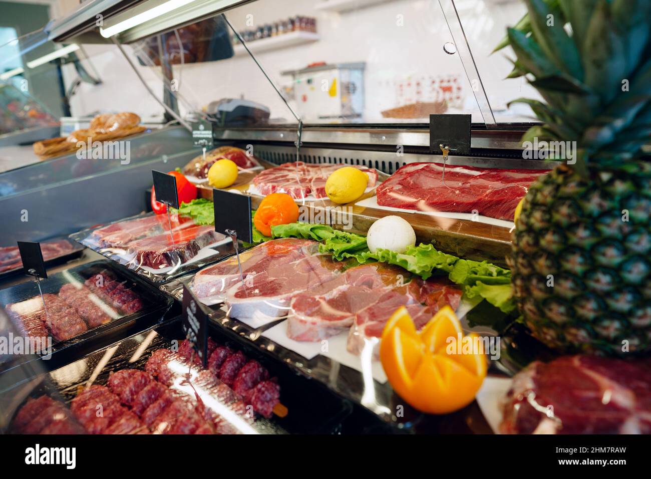 Fresh raw good quality meat on counter in Butcher shop Stock Photo - Alamy