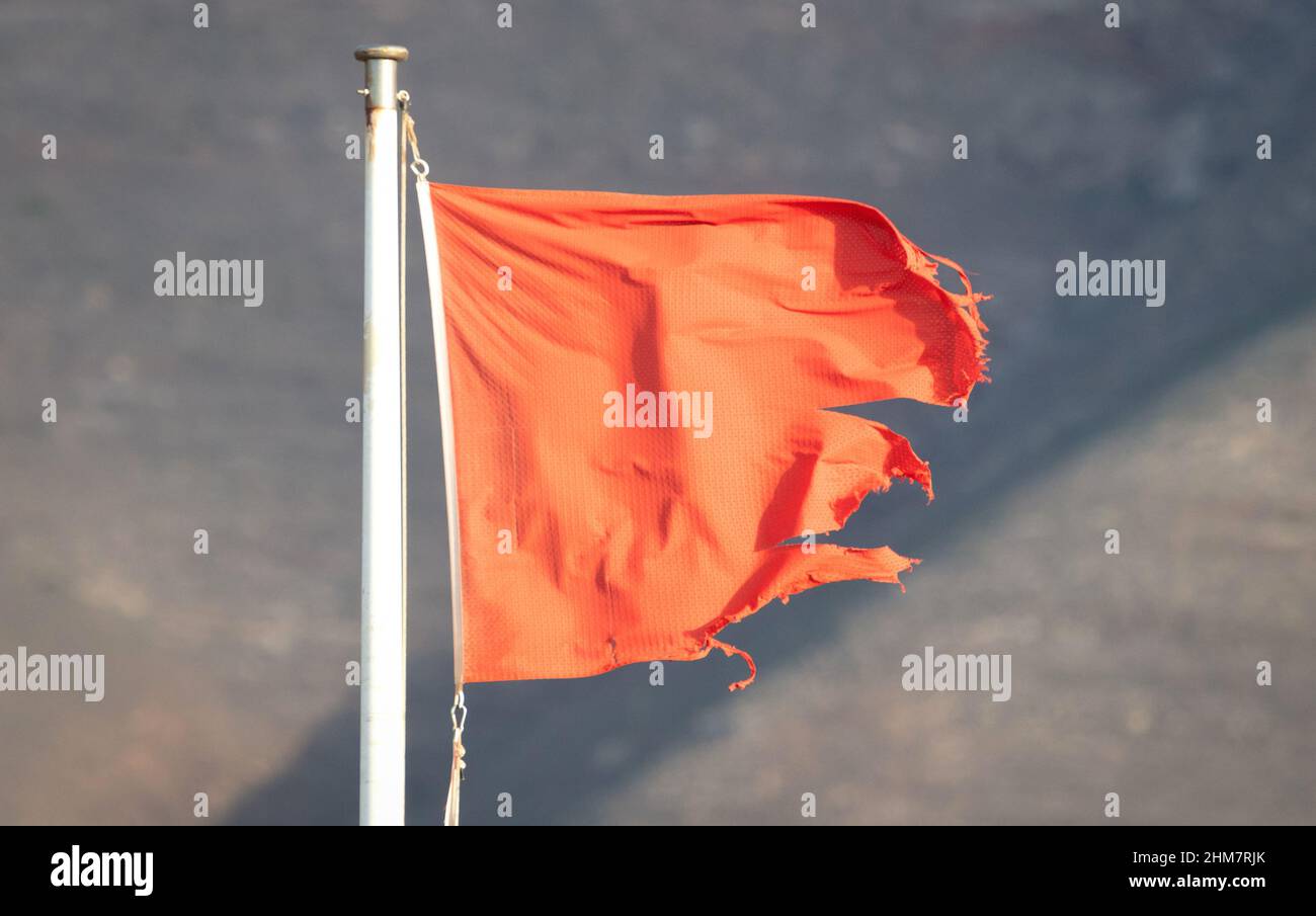 Red flag warning on beach in Spain (Lanzarote Stock Photo Alamy