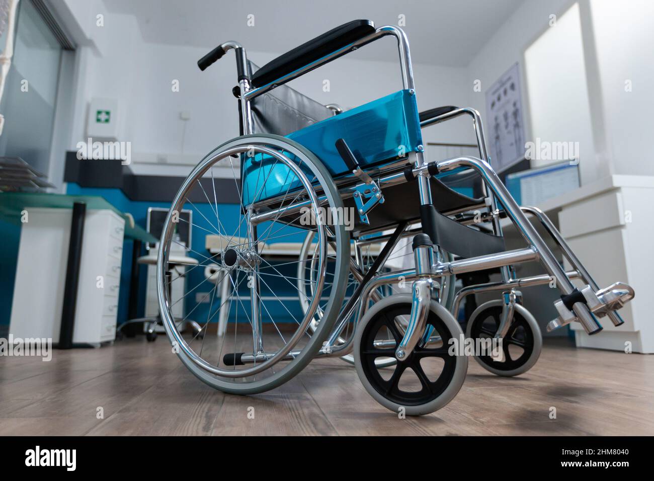 Invalid Room Empty office space with nobody in it having medical wheelchair for ...