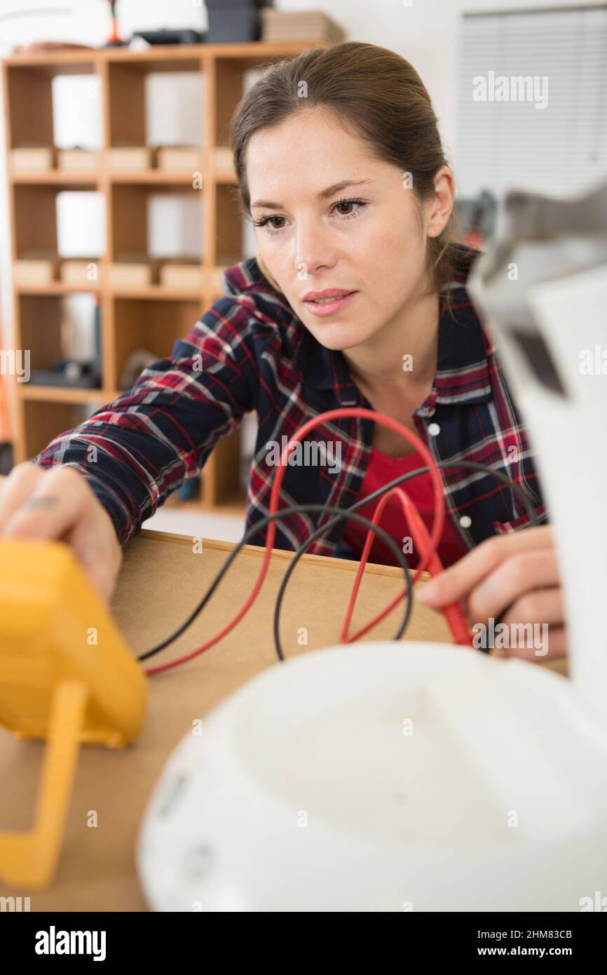 female electrician working with wires Stock Photo Alamy