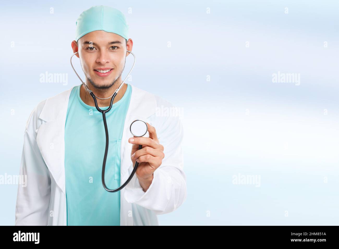 Young doctor with stethoscope heart breathing checkup check illness disease man copyspace copy space male Stock Photo