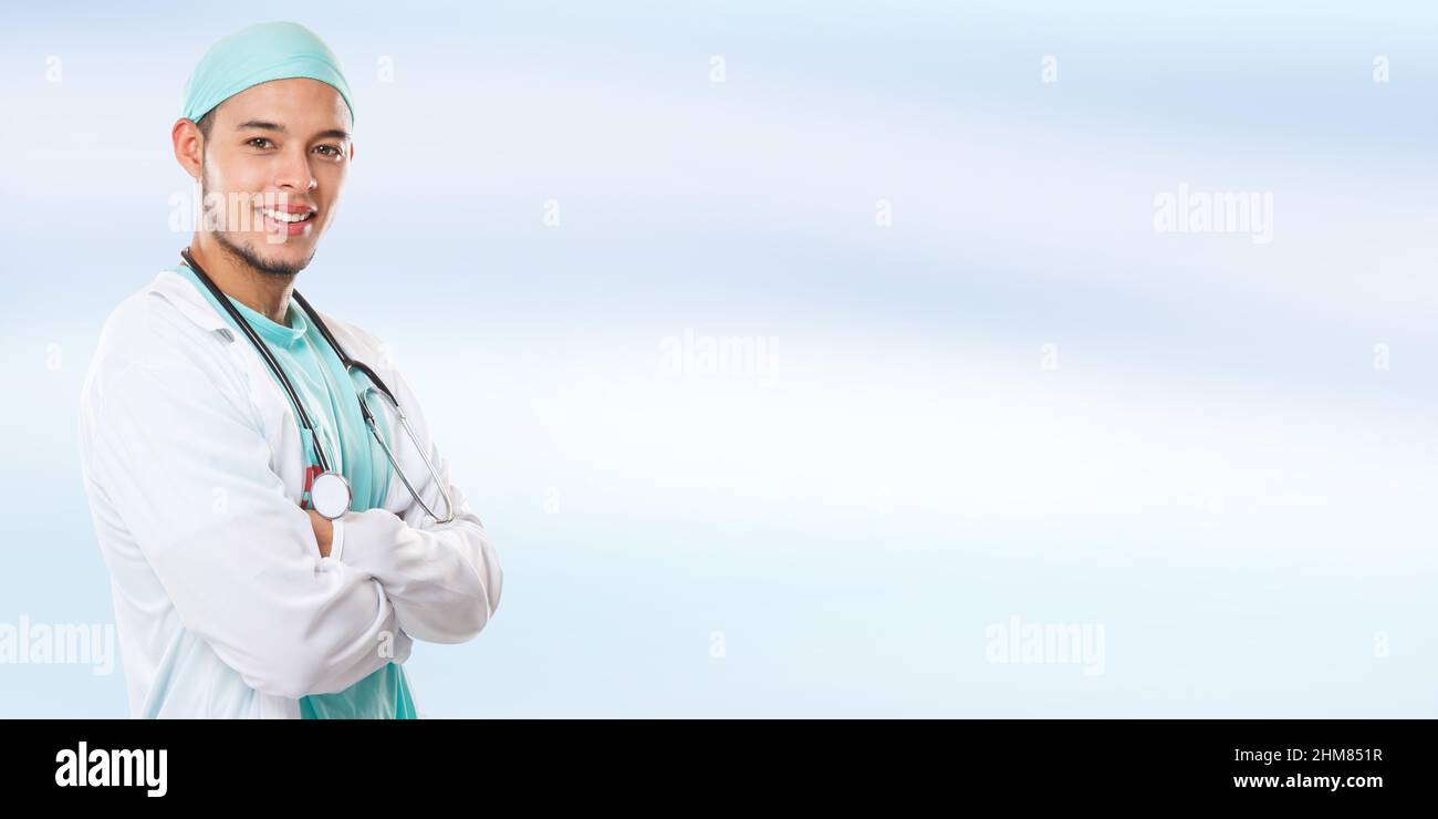 Young doctor portrait side view banner copyspace copy space occupation latin man job doctor's overall male Stock Photo