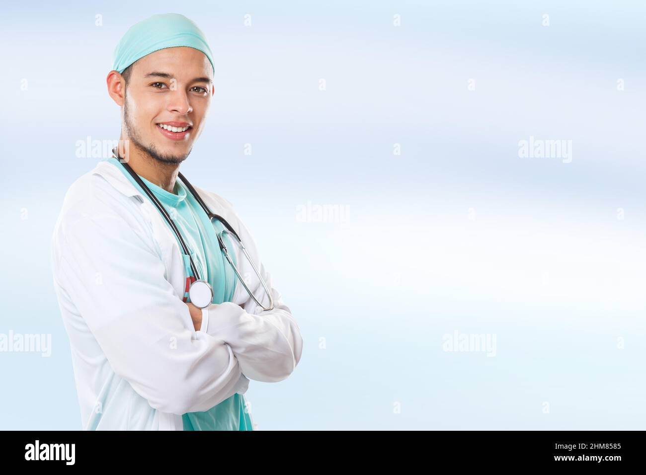 Young doctor portrait side view copyspace copy space occupation latin man job doctor's overall male Stock Photo