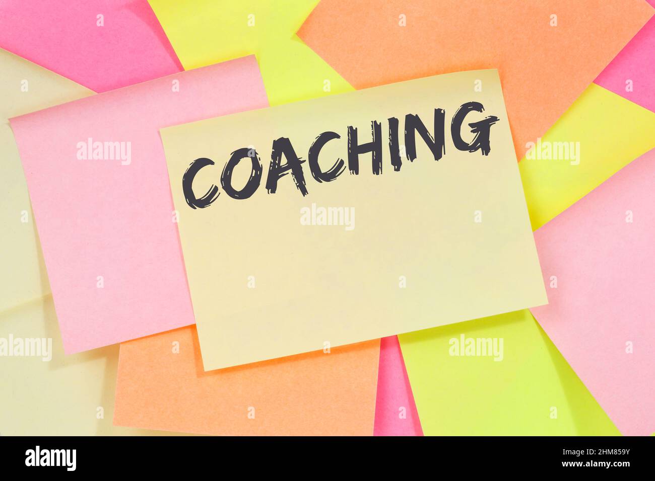 Coaching and mentoring education training workshop learning seminar note paper notepaper Stock Photo