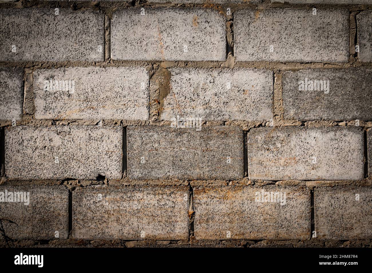 Old Gray concrete construction blocks background Stock Photo