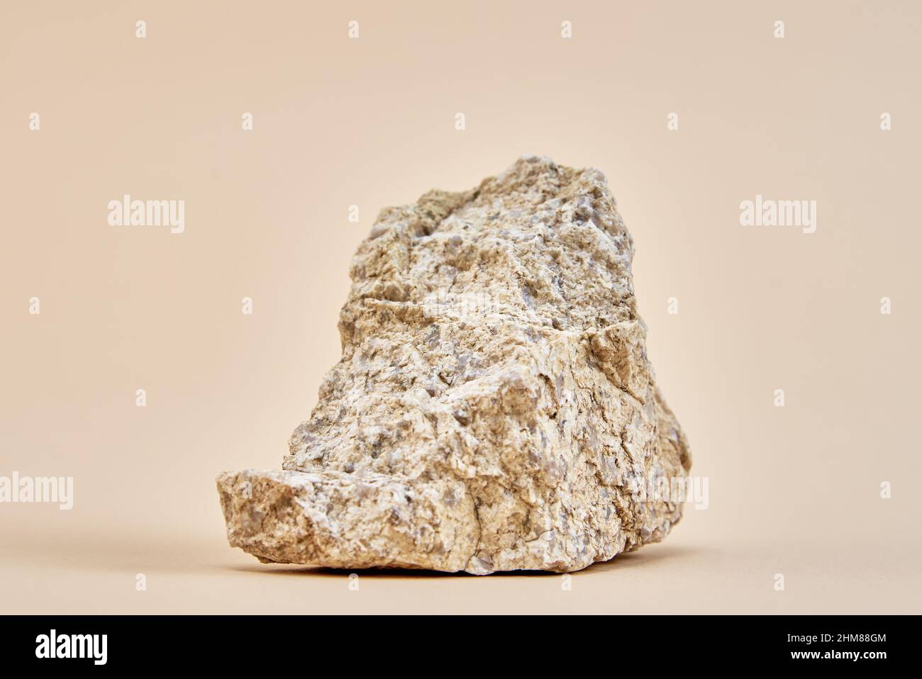 Natural granit stone on beige background, minimal product podium Stock Photo