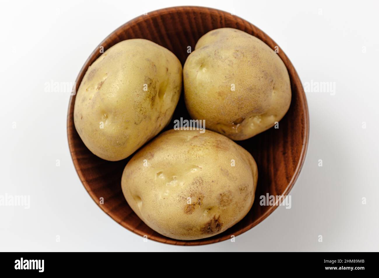 raw uncooked potatoes. hard, round vegetables. Vegetables rich in dietary fiber Stock Photo Alamy