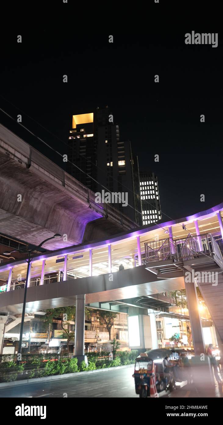 Asoke Skywalk At Asoke Bts Station With The Exchange Tower In The Asoke Skywalk At Asoke Bts Station With The Exchange Tower In The