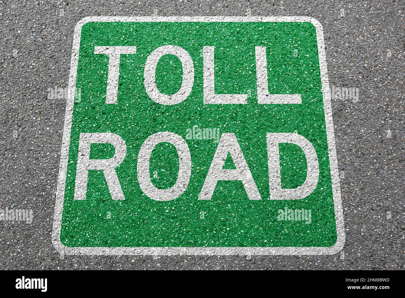 Toll road street city town pay paying clean air highway sign zone concept Stock Photo