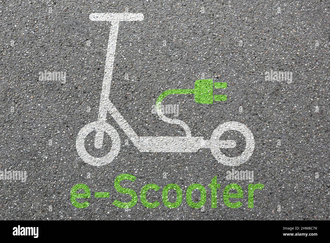 Electric scooter e-scooter road sign eco friendly green mobility city transport street Stock Photo