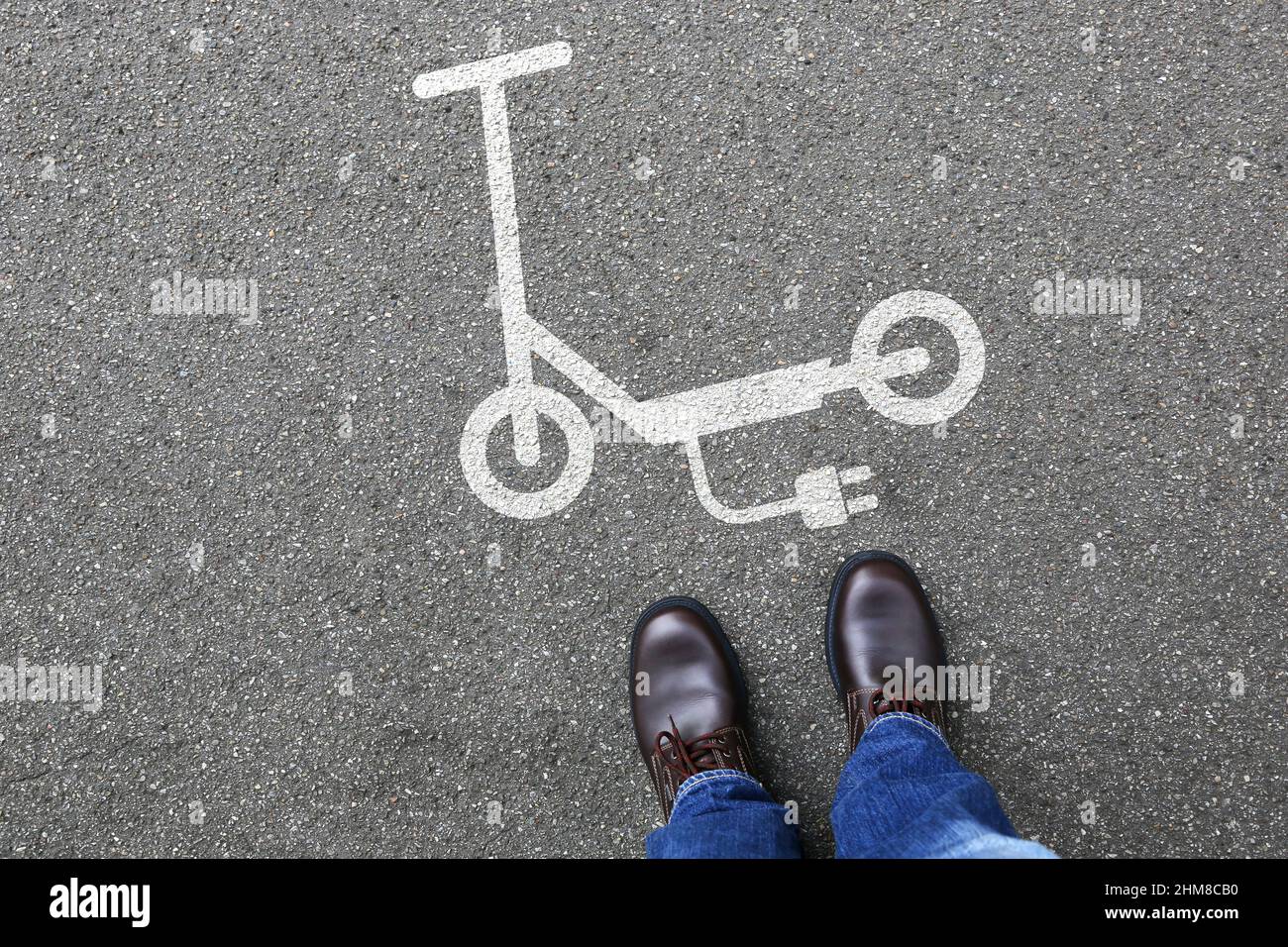 Man people electric scooter e-scooter road sign eco friendly mobility city transport transportation Stock Photo
