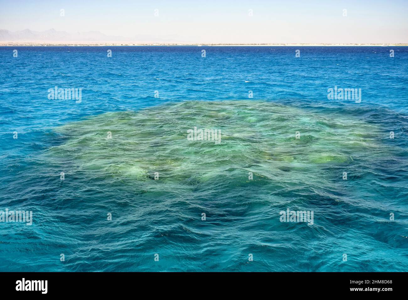 Small island with coral reefs in Red Sea in Egypt. Copy space ...