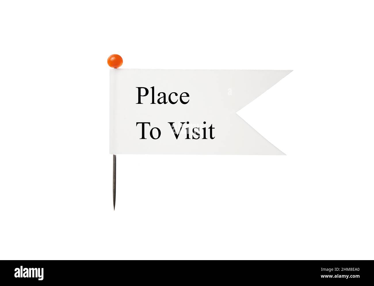 A flag with a white background that has the phrase Place To Visit attached to a pin that has a red top in front of a plain white background Stock Photo