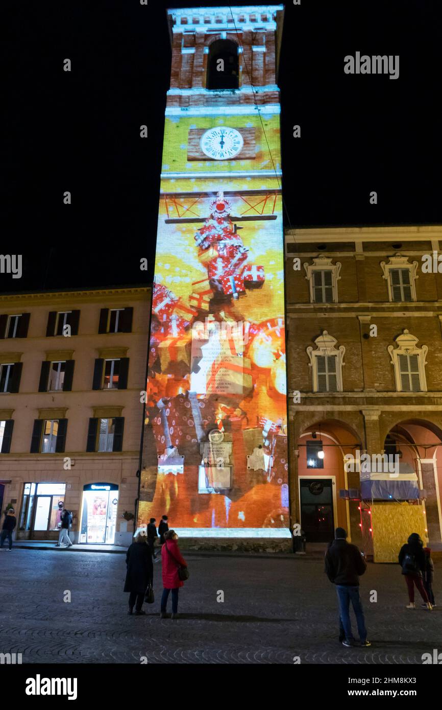 Piazza del Comune square, bright artistic Christmas decorations, Video Mapping on the Civic Tower; Fabriano, Marche, Italy, Europe Stock Photo