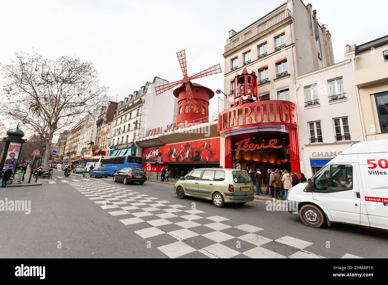 Paris , France - 21 February, 2010: Cabaret Moulin Rouge with red mill in Paris district Montmartre. Stock Photo