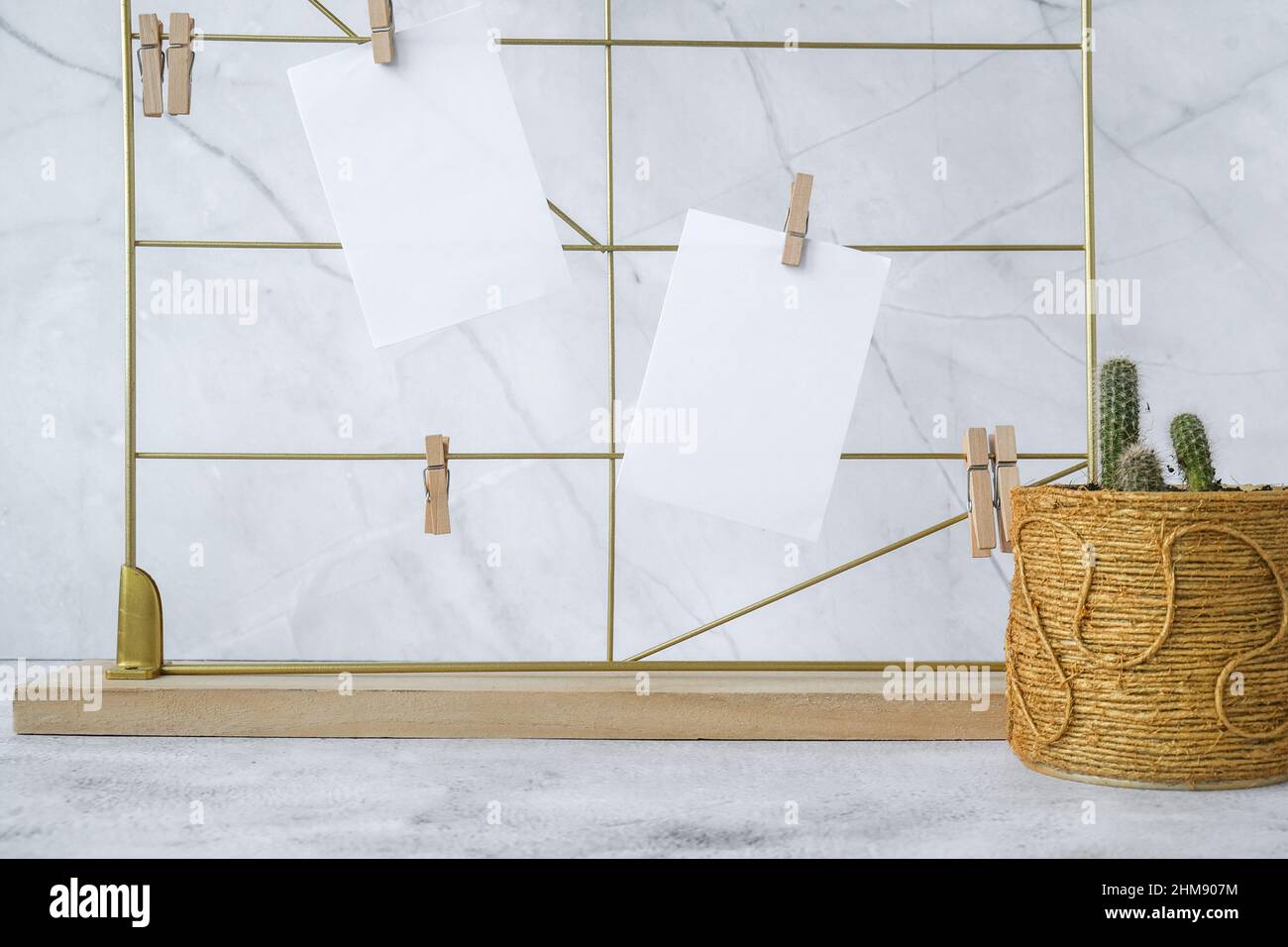 Cards and posters mock ups on grid board. Copy space. Feminine hipster