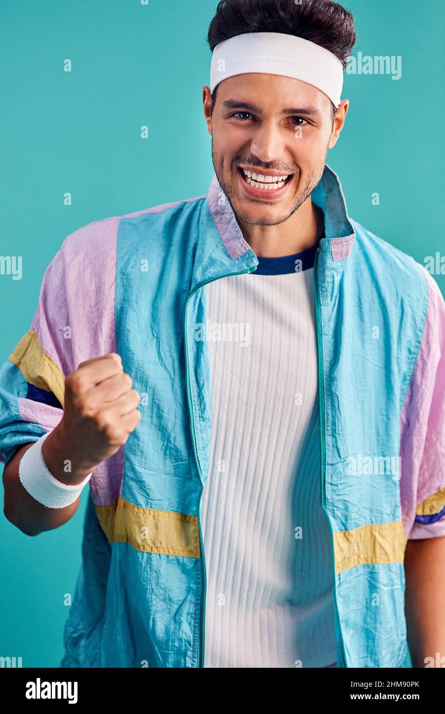 My style is what helps me to get all the girls. Cropped shot of a handsome young man styled in 80s fashion. Stock Photo