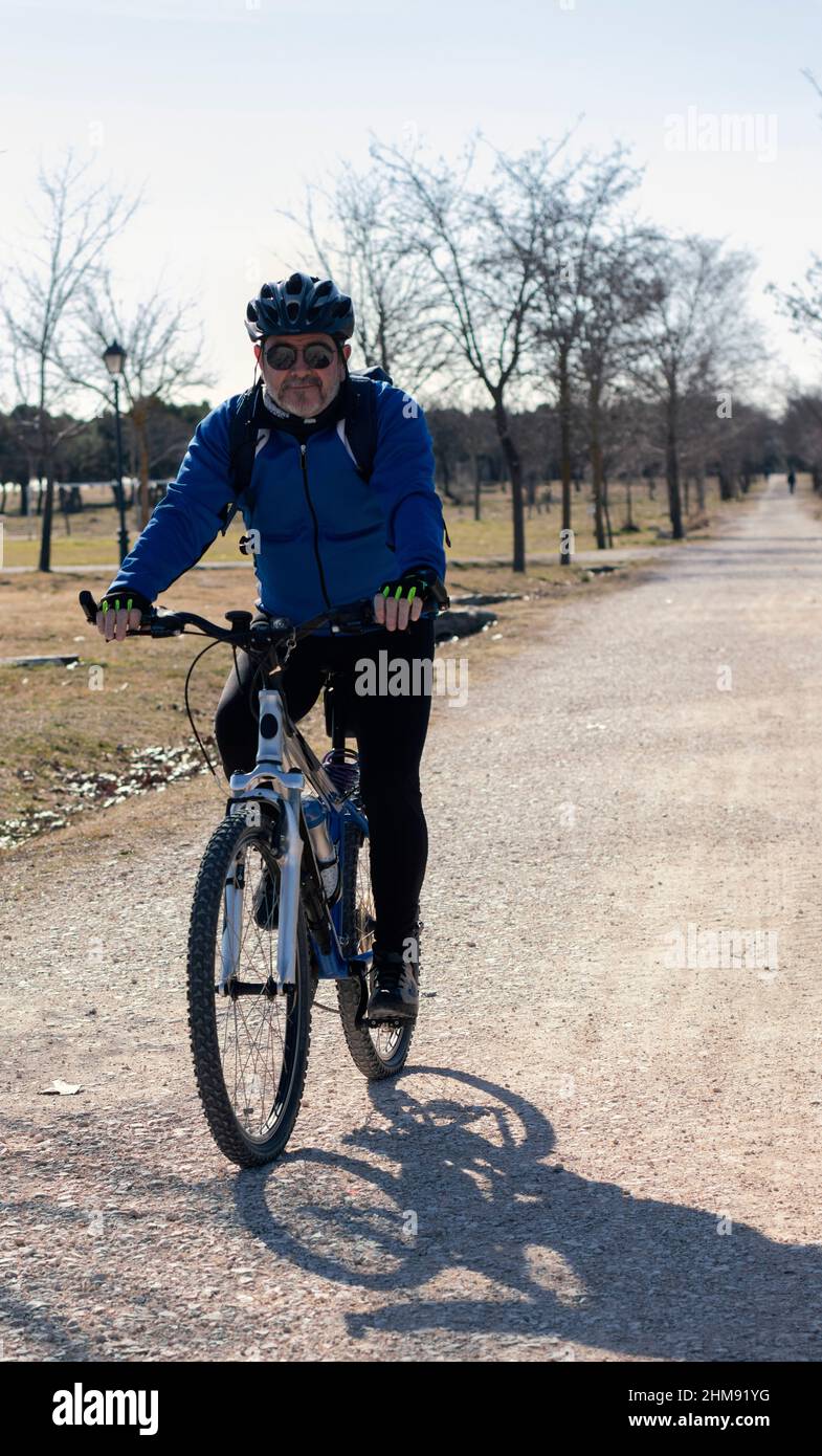Mature man taking a ride on his mountain bike Stock Photo