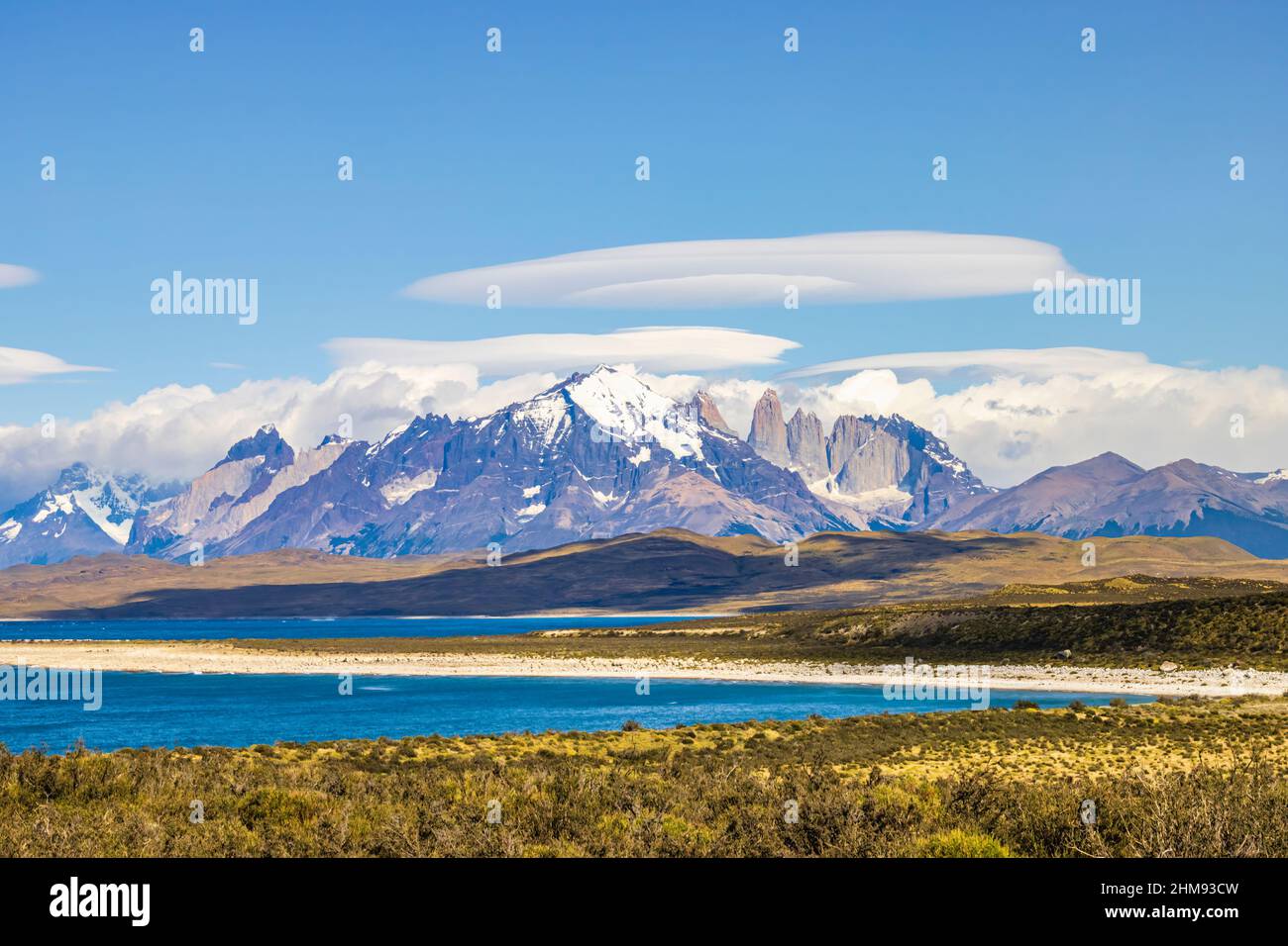 View to the jagged granite Torres del Paine mountain peaks in Torres del Paine National Park, Patagonia, southern Chile, viewed over Lake Sarmiento Stock Photo