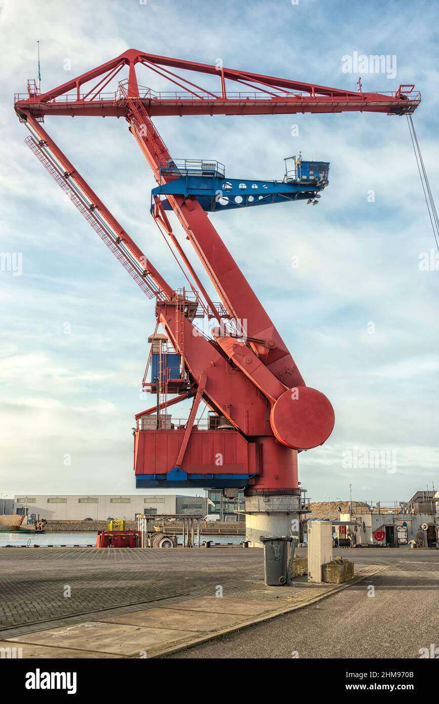 huge industrial red crane pontoon in the harbor Stock Photo
