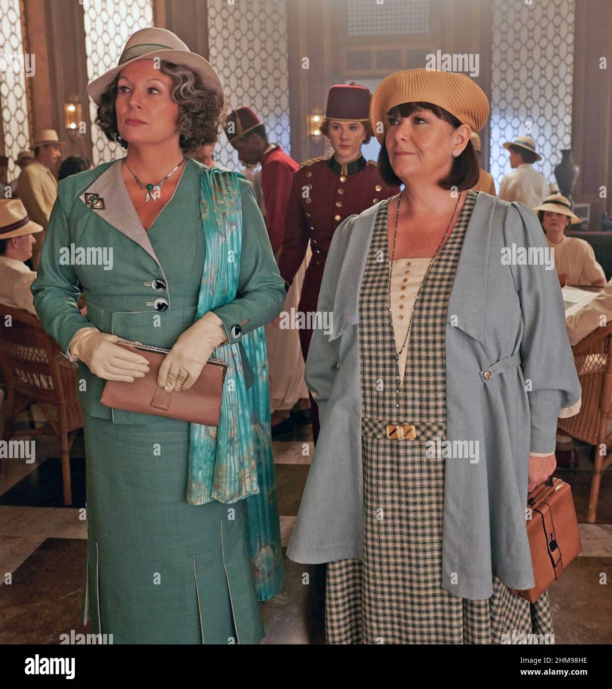 DEATH ON THE NILE 2022 20th Century Studios film with Jennifer Saunders at left as Marie Van Schuyler and Dawn French as Mrs Bowers. Stock Photo