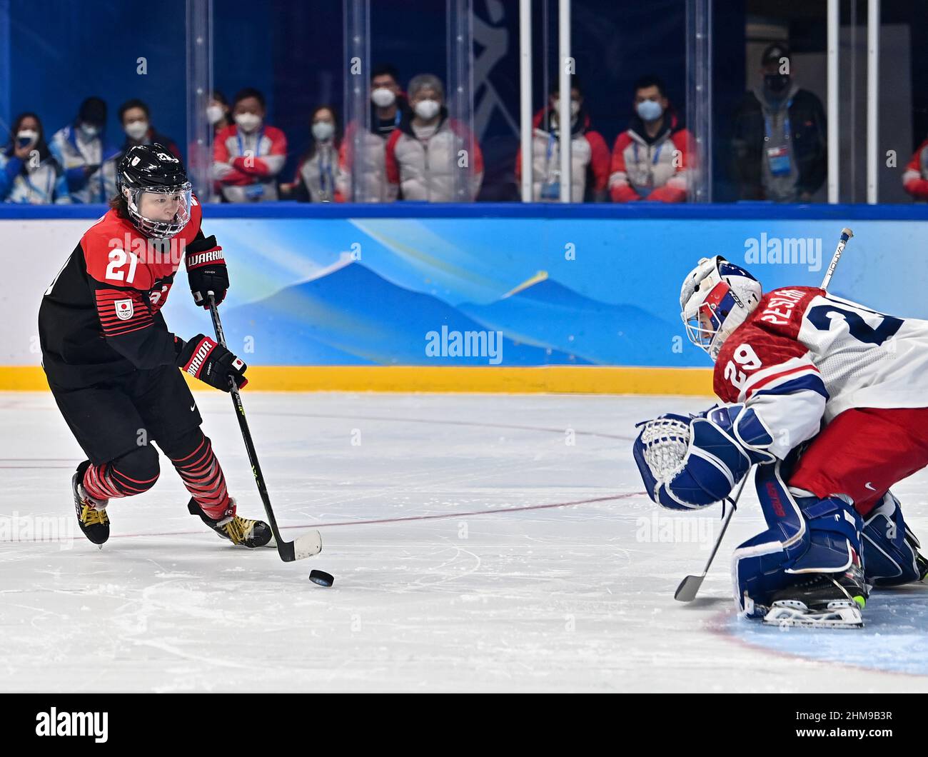 Beijing, China. 8th Feb, 2022. Kubo Hanae (L) of Japan goes for the net at  penalty-shot shootout during the ice hockey women's Group B match between  Japan and the Czech Republic at