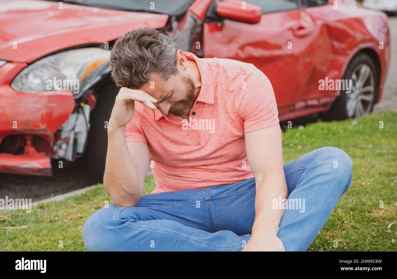 Car crash accident. Upset driver after traffic accident Stock Photo - Alamy