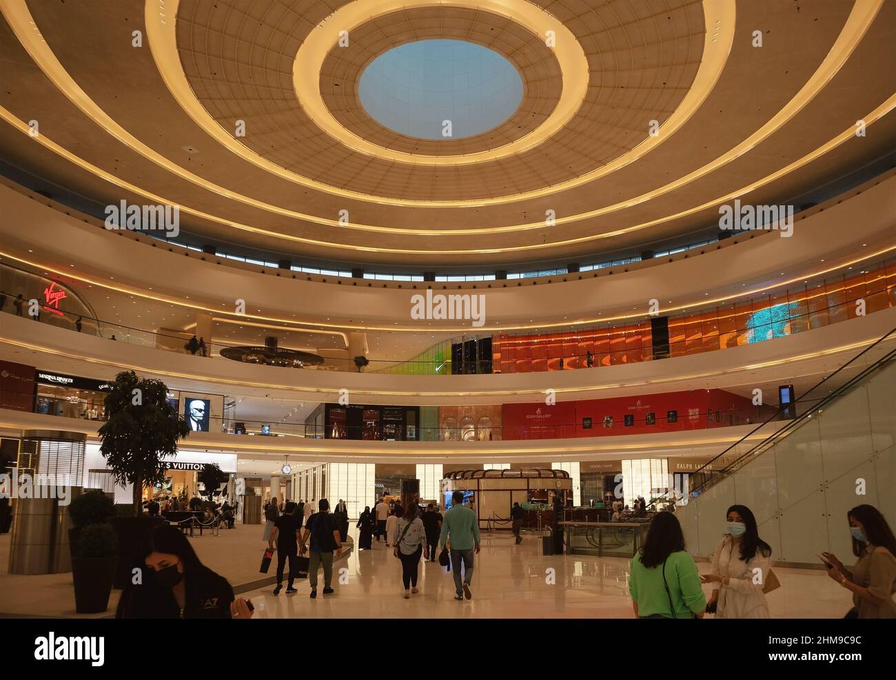 Dubai, United Arab Emirates - January 19, 2022: Interior of Dubai Mall, the biggest mall in town with a lot of fashion shops, restaurants and one big Stock Photo