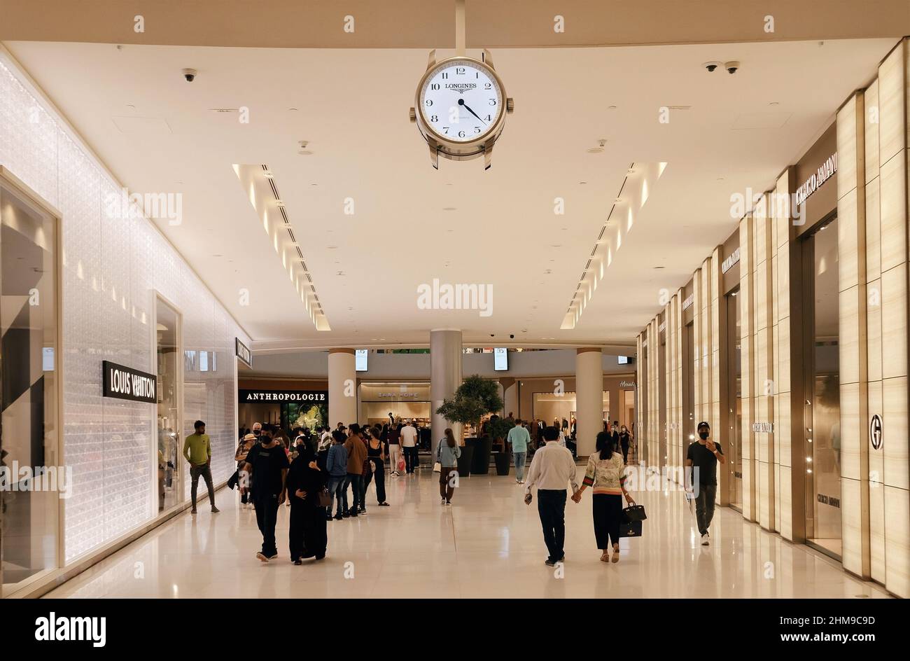 Dubai, United Arab Emirates - January 19, 2022: Interior of Dubai Mall, the biggest mall in town with a lot of fashion shops, restaurants and one big Stock Photo