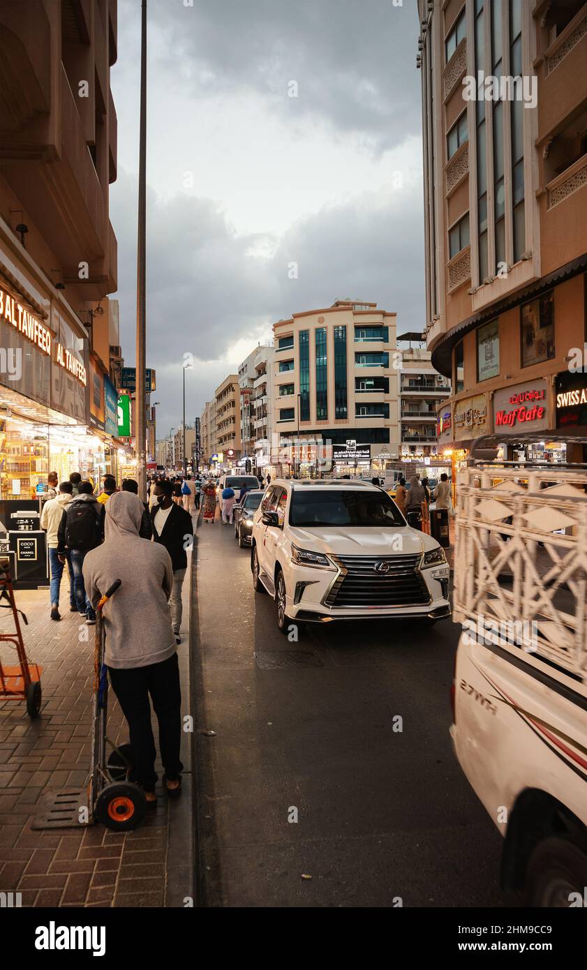 Dubai, United Arab Emirates - January 21, 2022: Street life in Golden Souk, part of town with a lot of shops for gold and spices from Iran, Iraq, Afgh Stock Photo