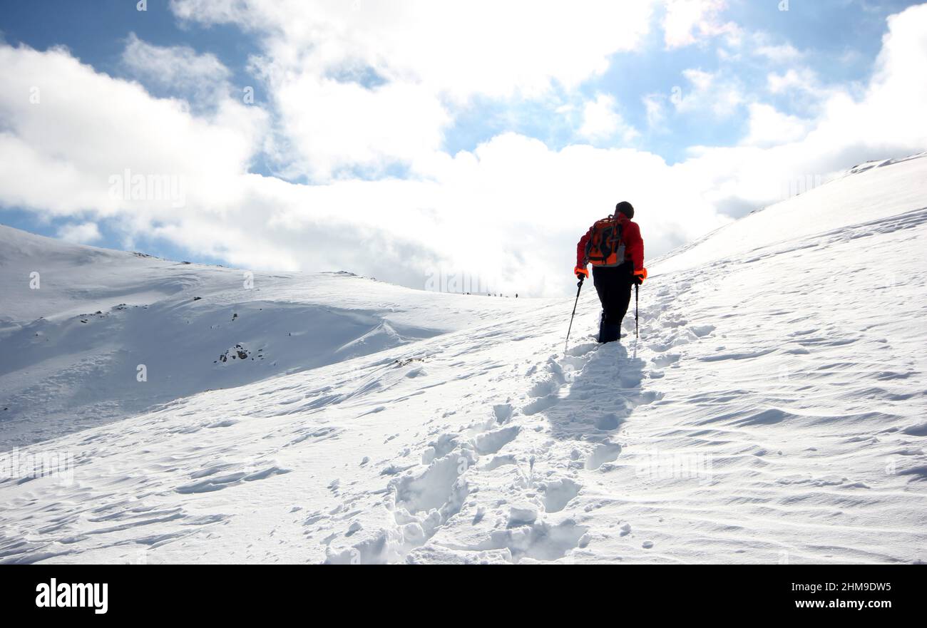 Man climbing winter sports hi-res stock photography and images - Alamy