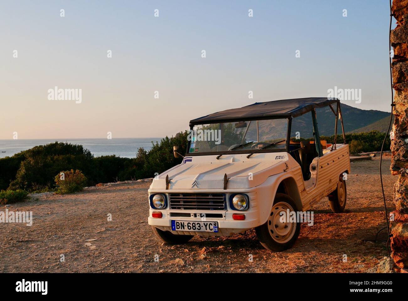 Galeria, Corsica, 20.07.2019. Vintage car in the hills of Galeria overlooking the Mediterranean Sea. Corsica, France. High quality photo Stock Photo