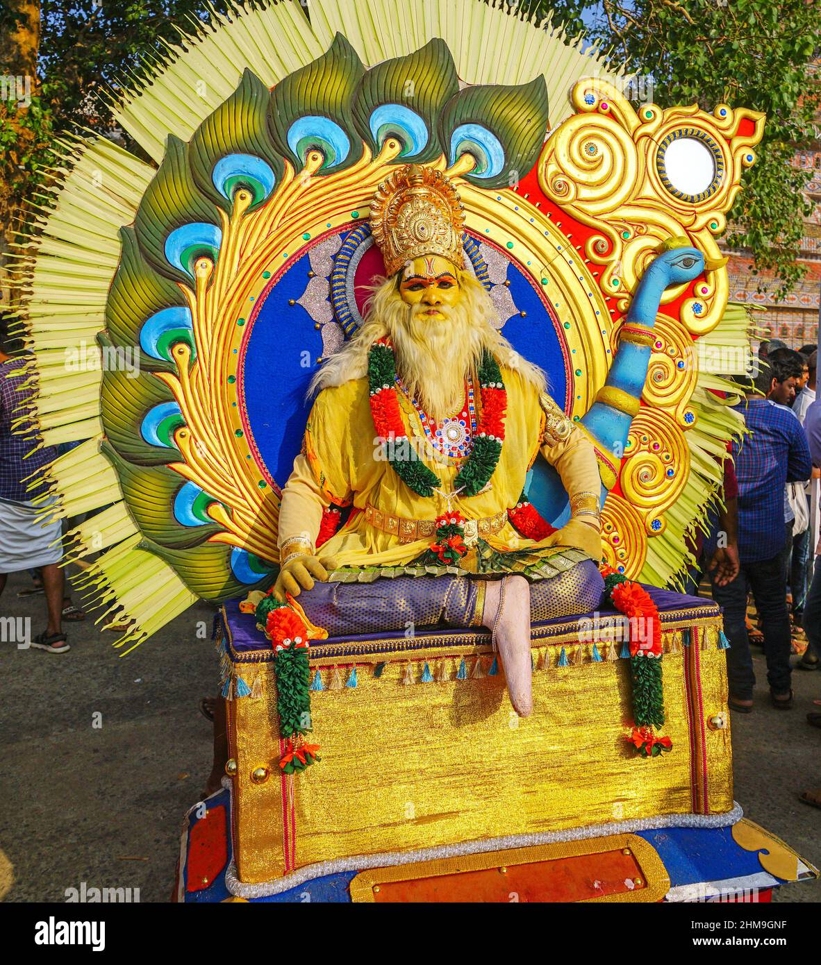 Artist in colourful carnival costumes during Pooram festival