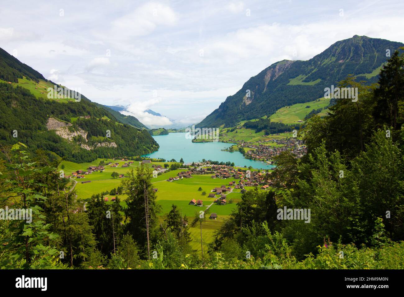 Lake, mountains and village. Aerial view on village in Austria Stock Photo