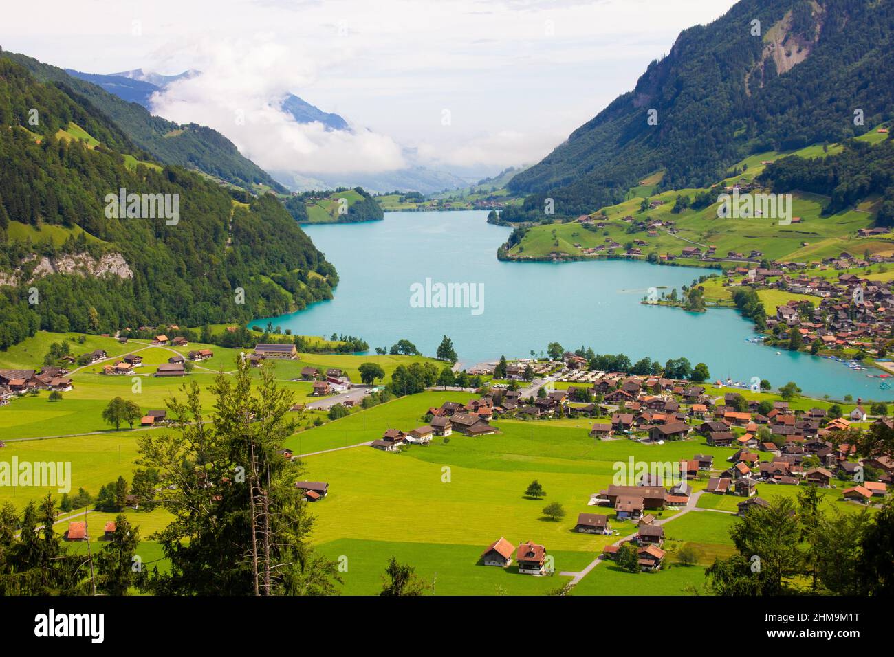Lake, mountains and village. Aerial view on village in Austria Stock Photo