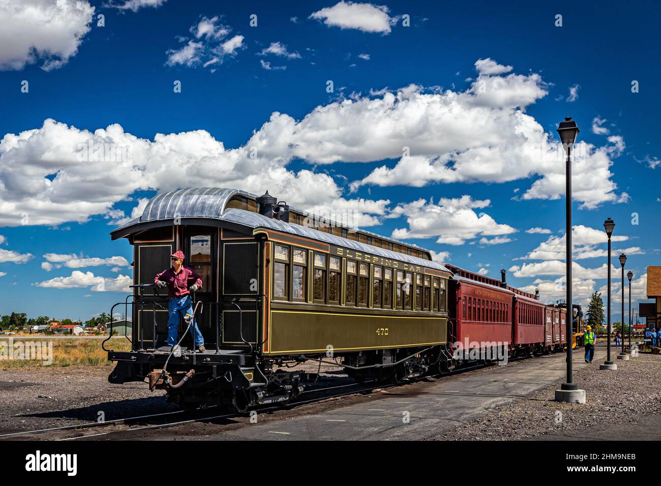 Antonito, CO - August 23, 2021: A vintage passenger sleeping car is backed out of the rail yard during a public steam up in the Cumbres and Toltec Rai Stock Photo