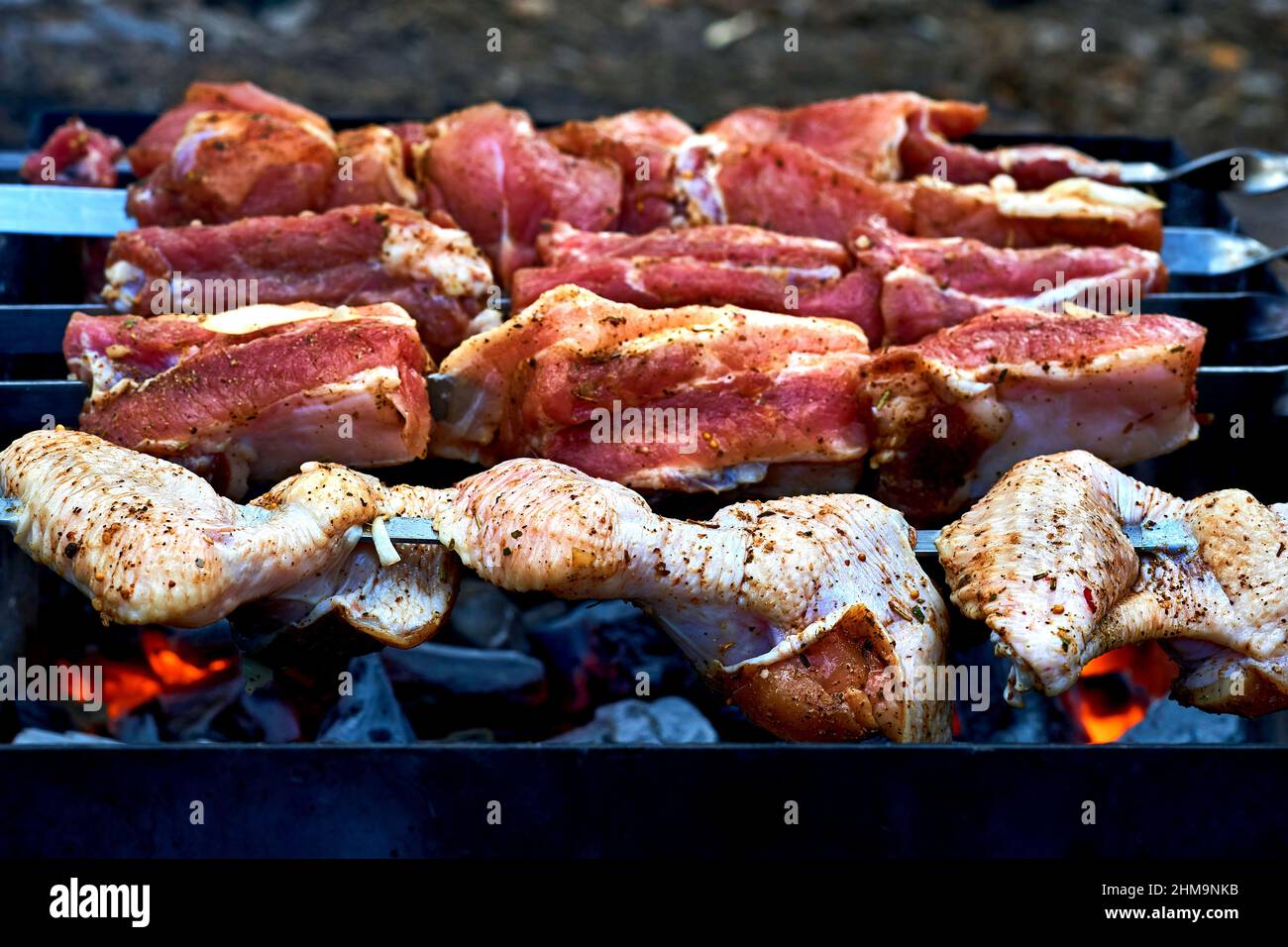 Fresh prepared meat on grill for cooking Stock Photo Alamy