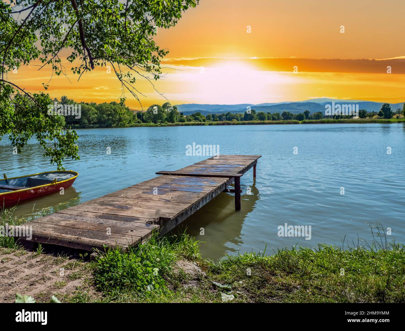 Sunset Jetty Rides Jetty in sunset lake hi-res stock photography and images - Alamy