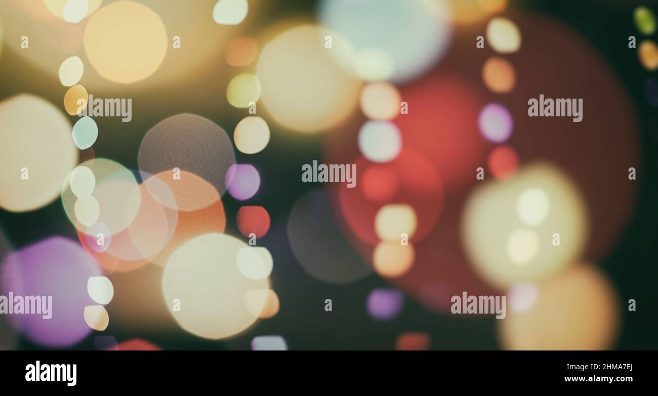 Christmas wallpaper decorations concept.holiday festival backdrop:sparkle circle lit celebrations display. Stock Photo