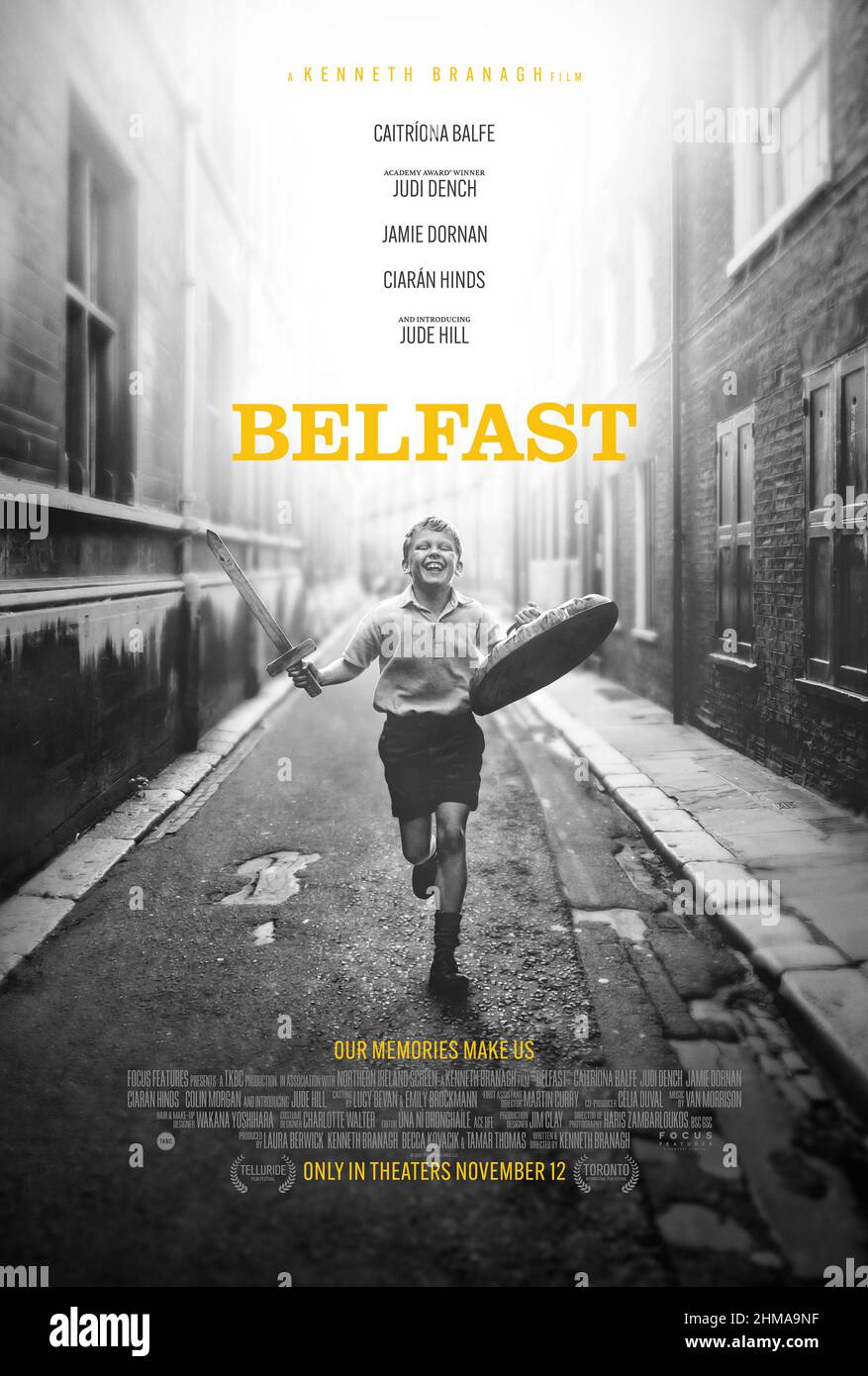 Belfast (2021) directed by Kenneth Branagh and starring Jude Hill, Lewis McAskie and Caitriona Balfe. A young boy and his working-class Belfast family experience the tumultuous late 1960s. Stock Photo