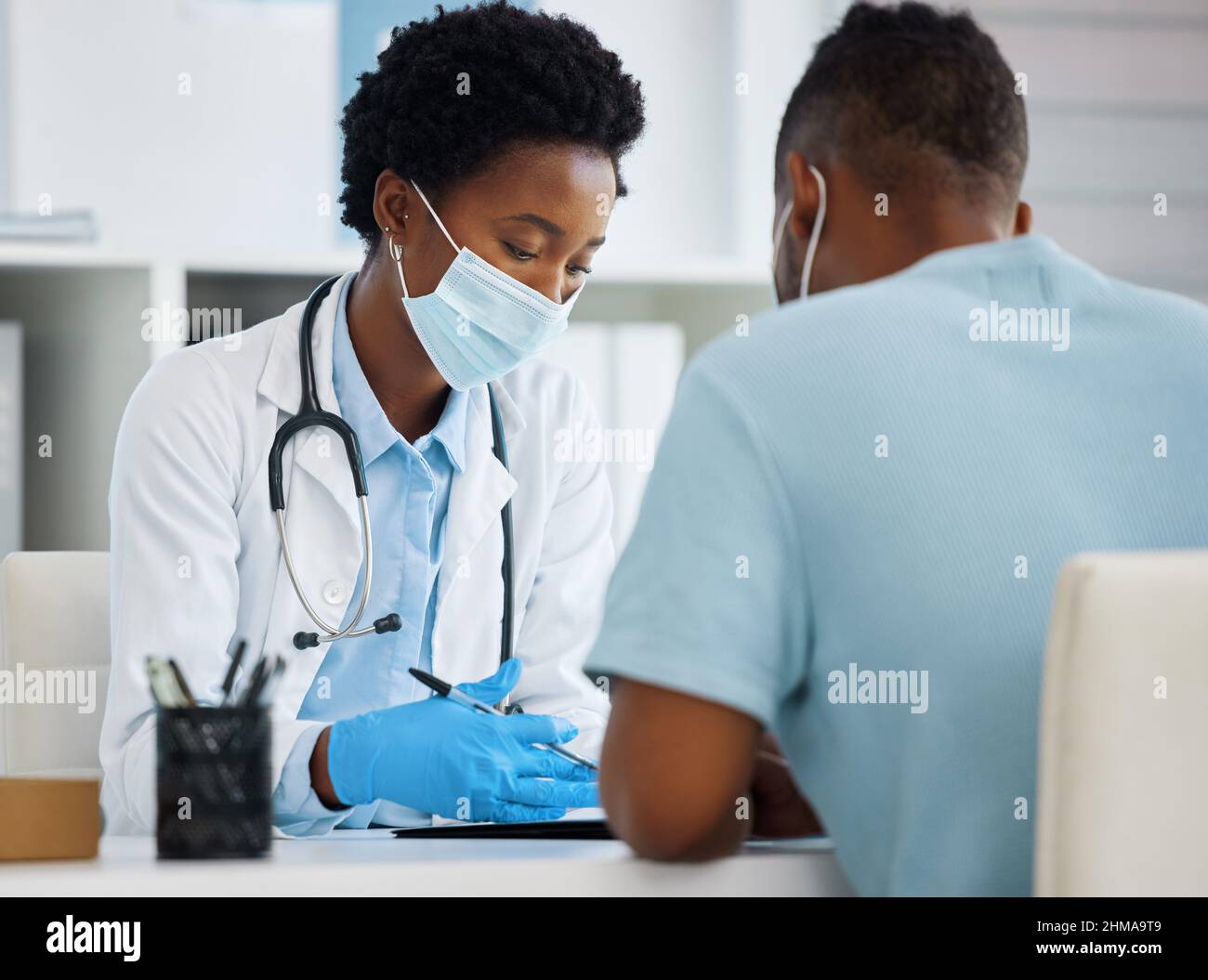 Doctor Patient Consultation Desk Candid Hi Res Stock Photography And