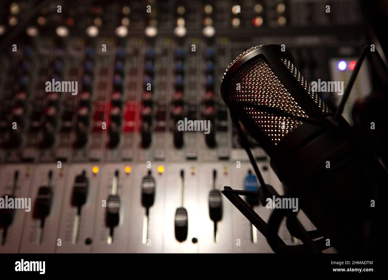 sound mixer and faders with condenser microphone DJ disco Stock Photo