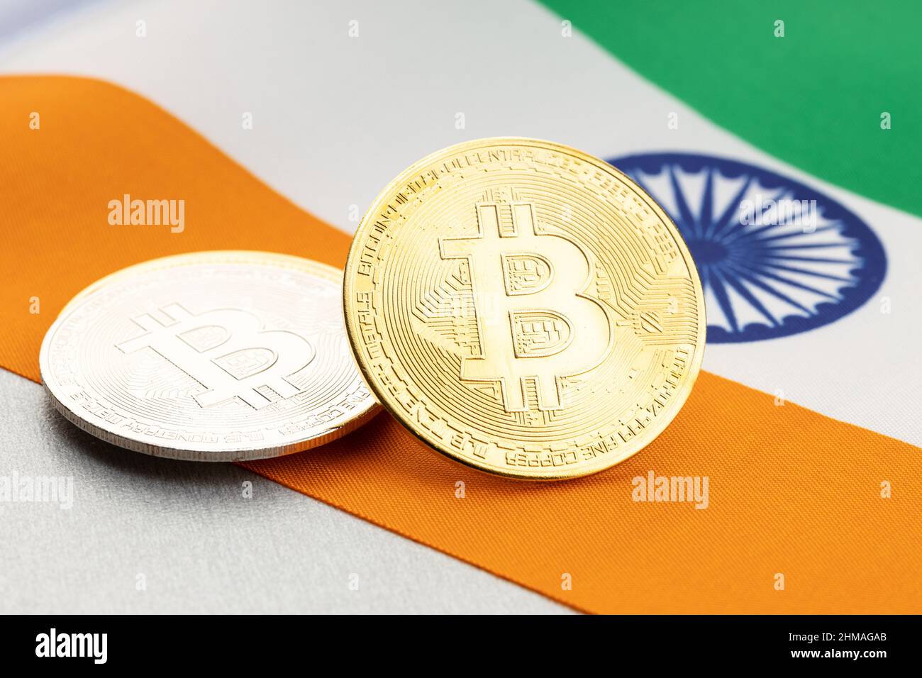 Bitcoin cryptocurrency coins on national flag of India. Crypto law  regulation concept Stock Photo - Alamy