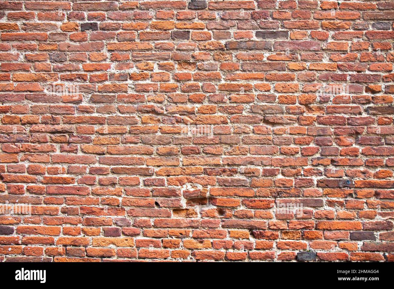 Detail of an old brick wall without plaster Stock Photo Alamy